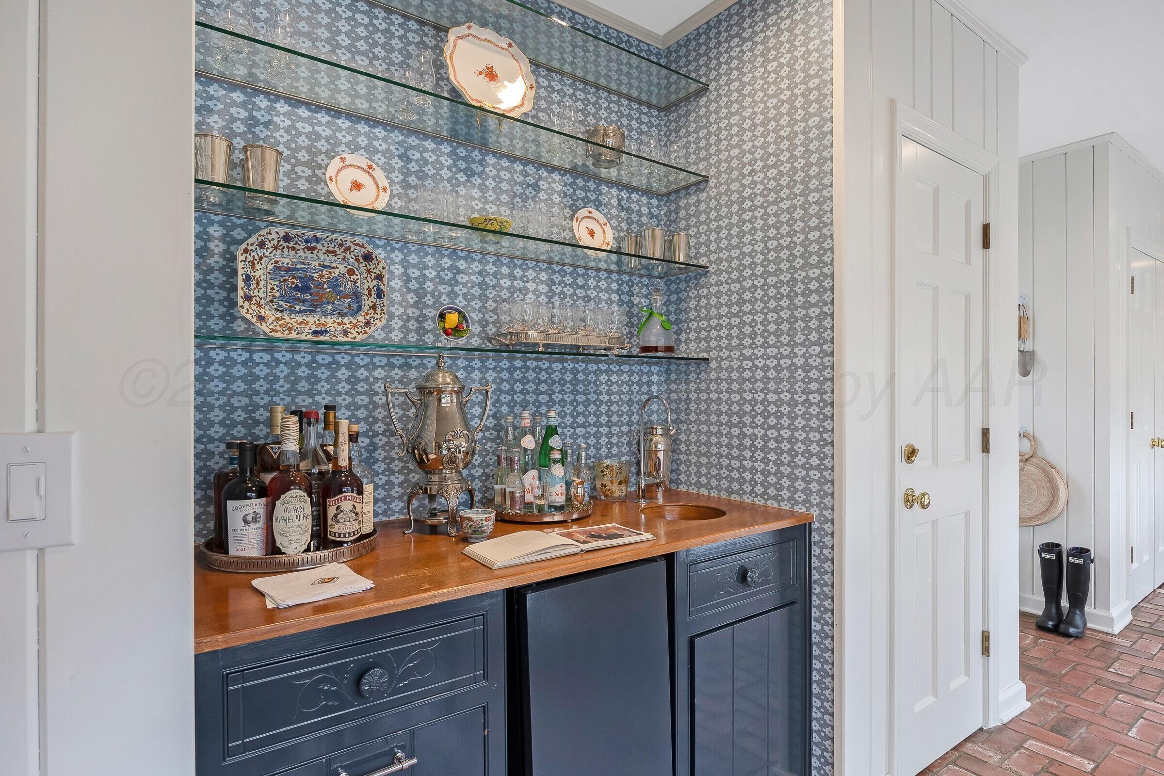 3003 South Hughes Street Amarillo, TX 79109 - Photo 56 of 76 a bathroom with a sink and a mirror