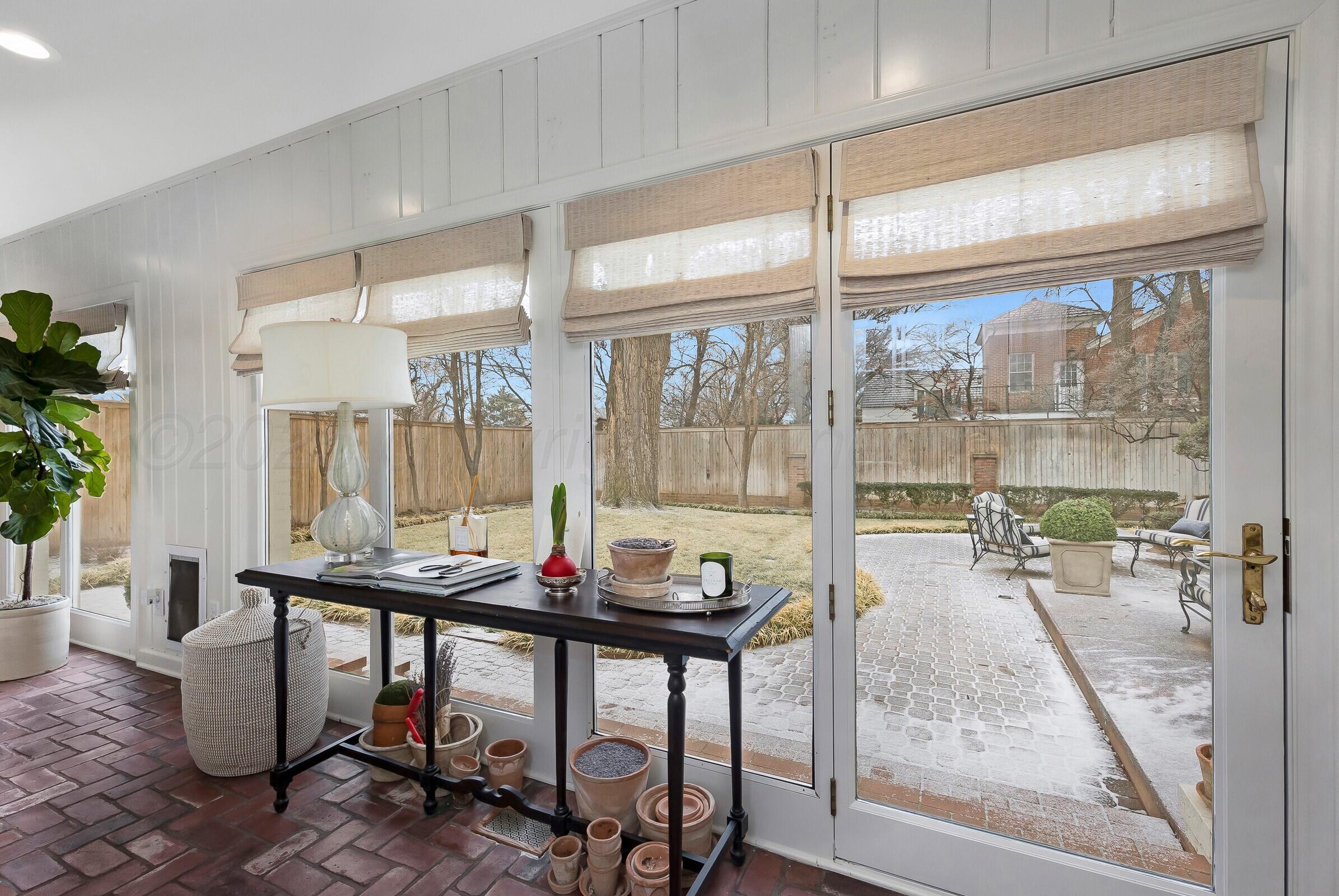 3003 South Hughes Street Amarillo, TX 79109 - Photo 57 of 76 a view of a dining room with furniture window and outside view