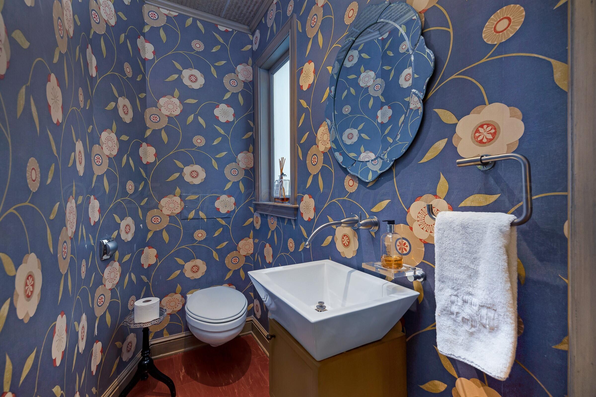 3003 South Hughes Street Amarillo, TX 79109 - Photo 59 of 76 a bathroom with a toilet and a sink