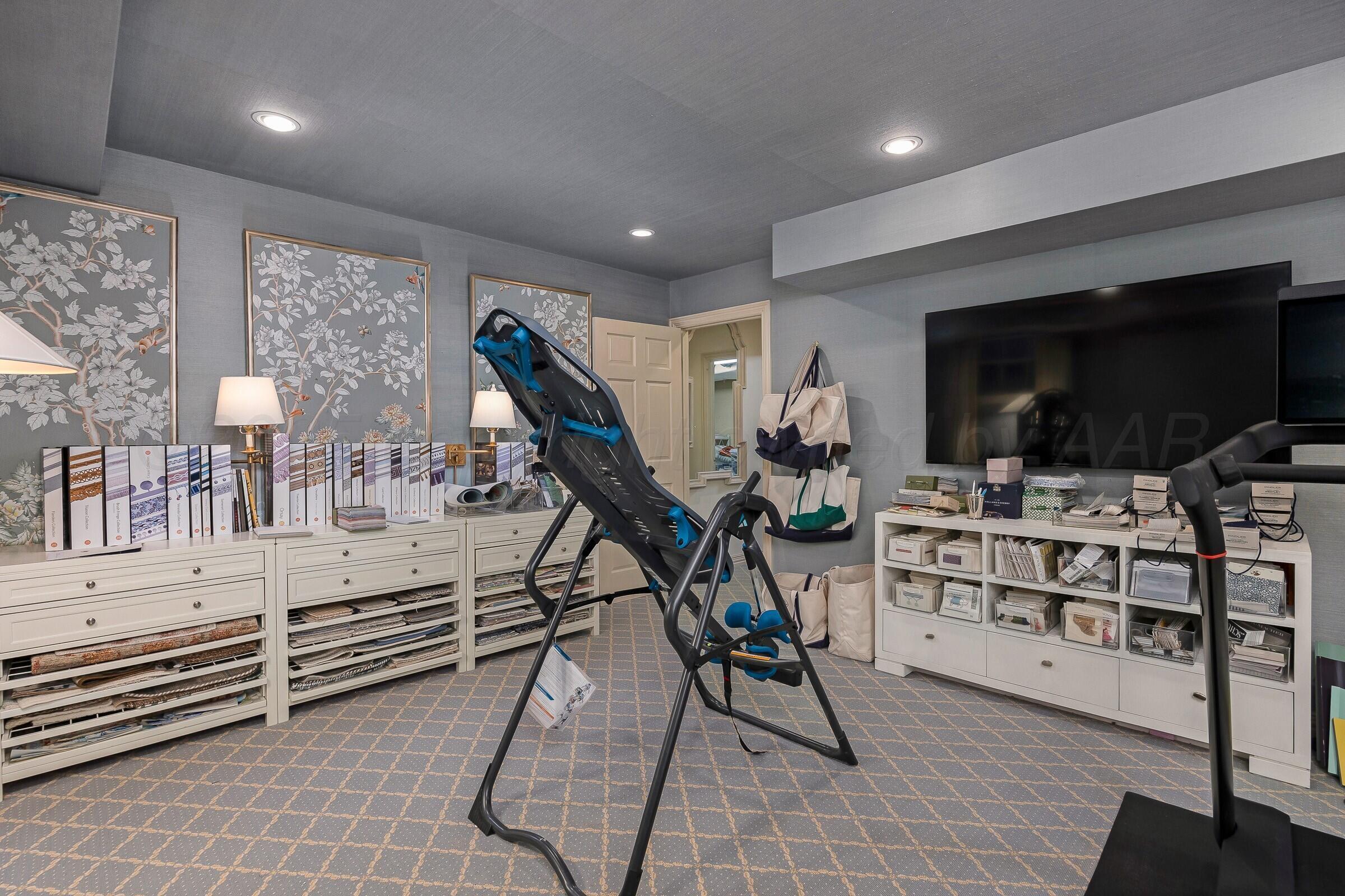 3003 South Hughes Street Amarillo, TX 79109 - Photo 66 of 76 a view of a livingroom with furniture and a flat screen tv