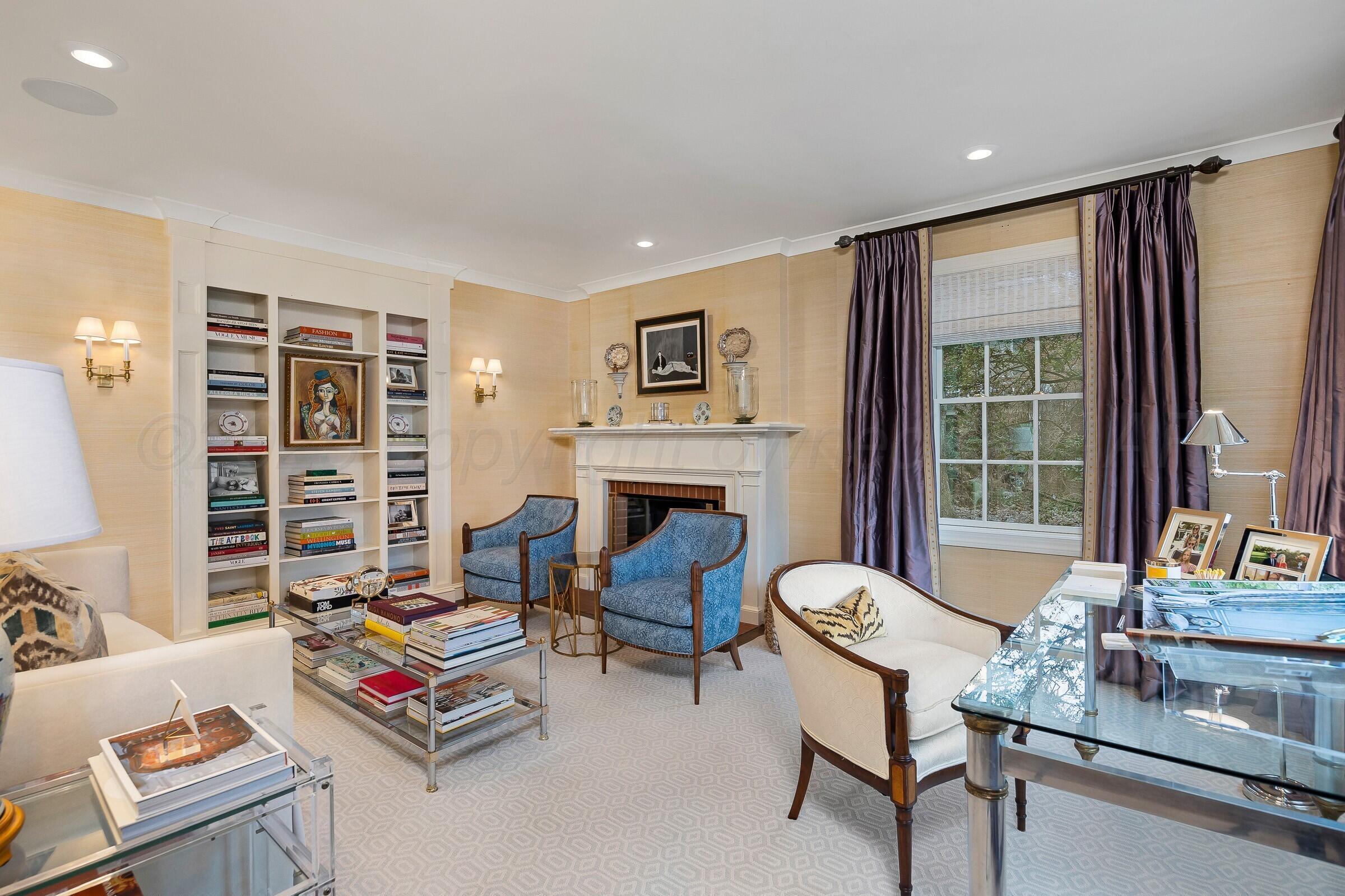 3003 South Hughes Street Amarillo, TX 79109 - Photo 7 of 76 a living room with furniture and a fireplace
