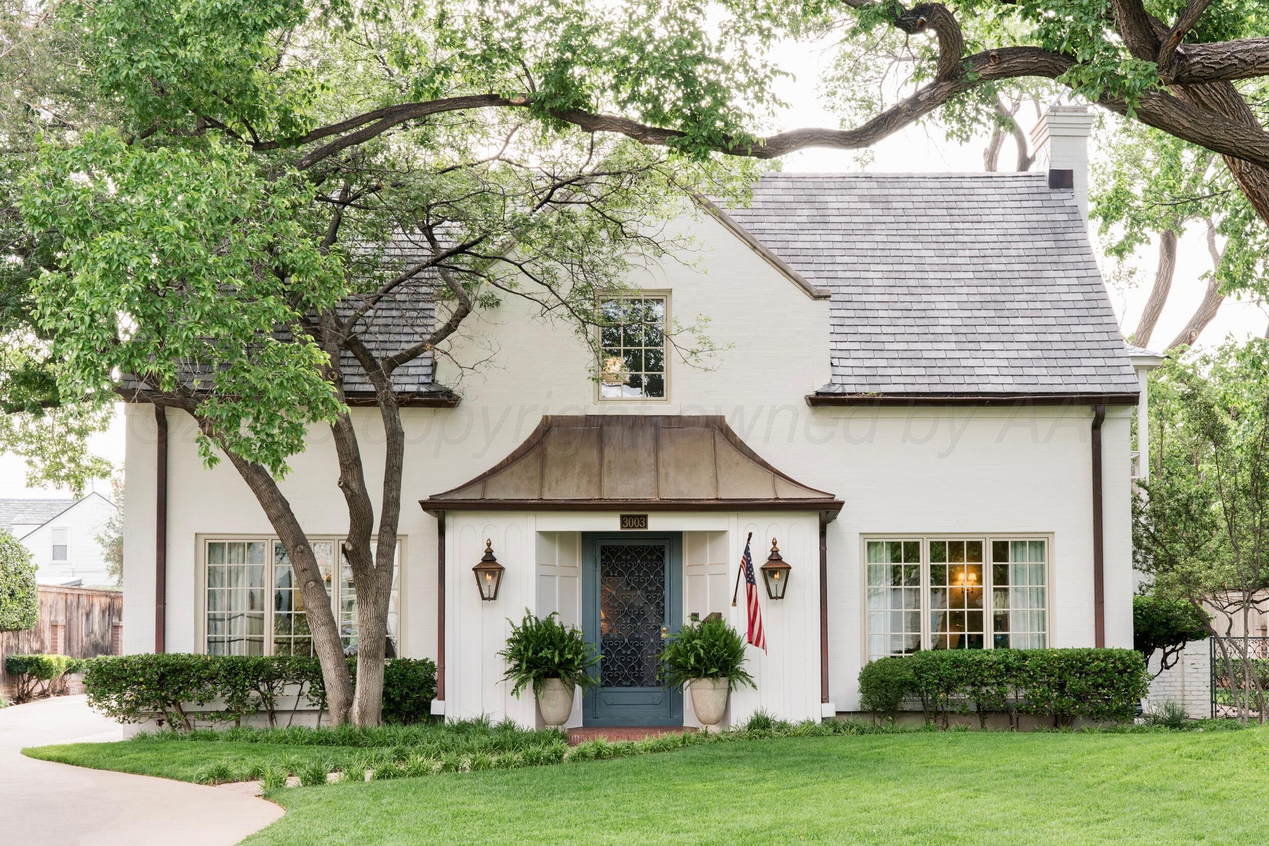 3003 South Hughes Street Amarillo, TX 79109 - Photo 74 of 76 front view of a house with a yard