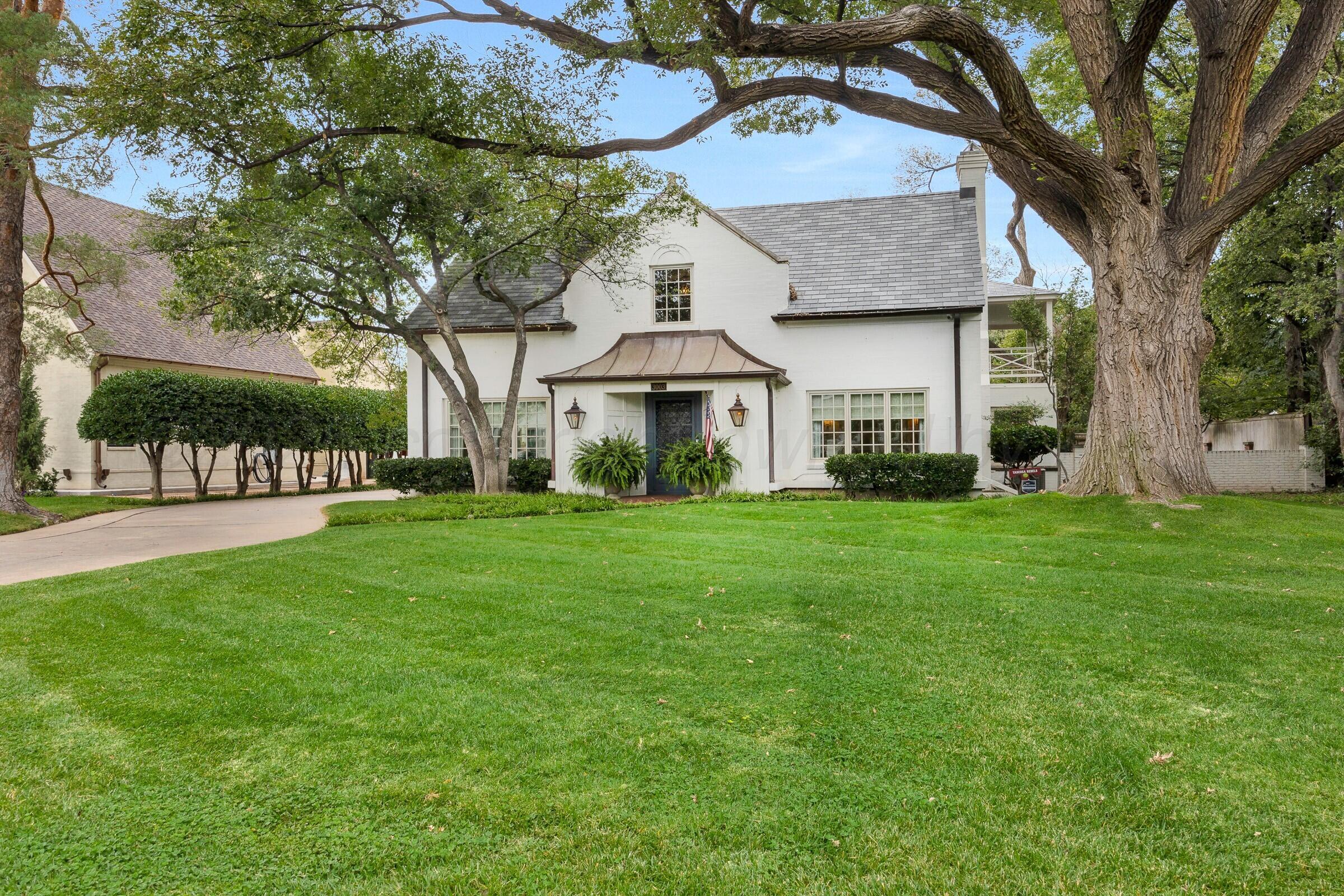 3003 South Hughes Street Amarillo, TX 79109 - Photo 75 of 76 a front view of a house with garden