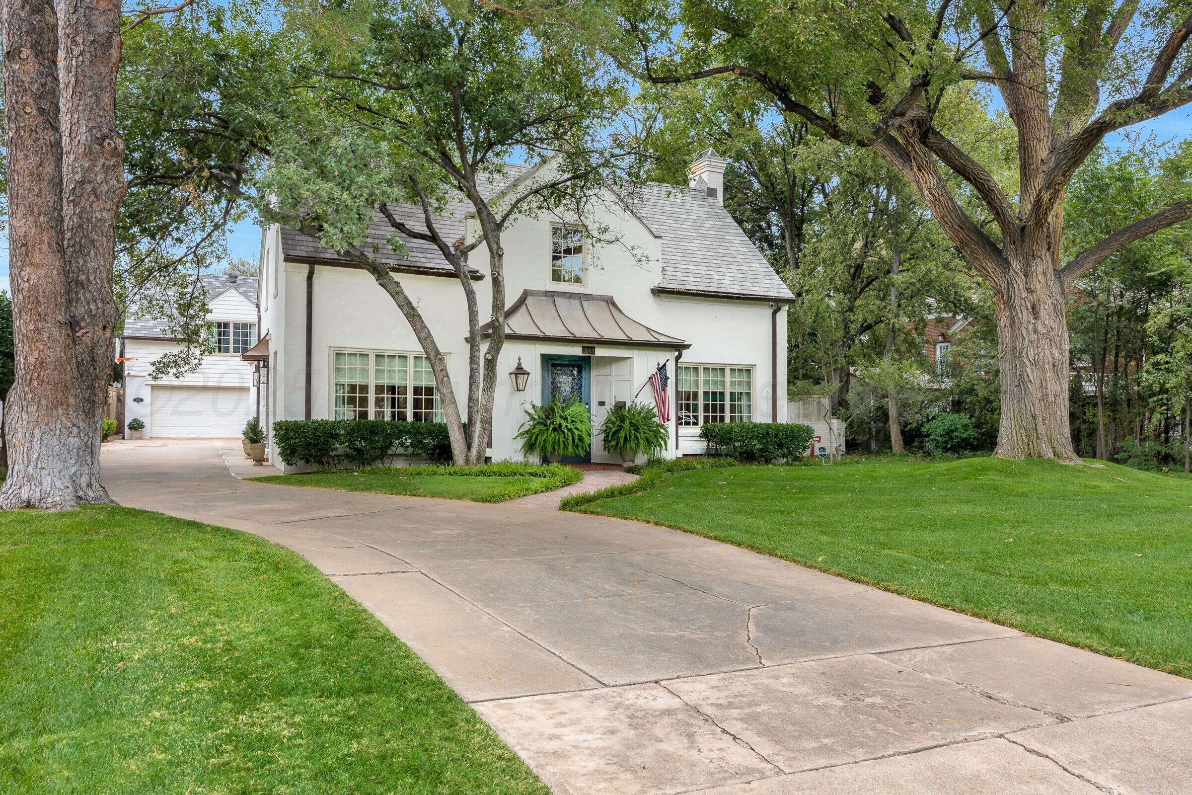 3003 South Hughes Street Amarillo, TX 79109 - Photo 76 of 76 a front view of house with yard and green space