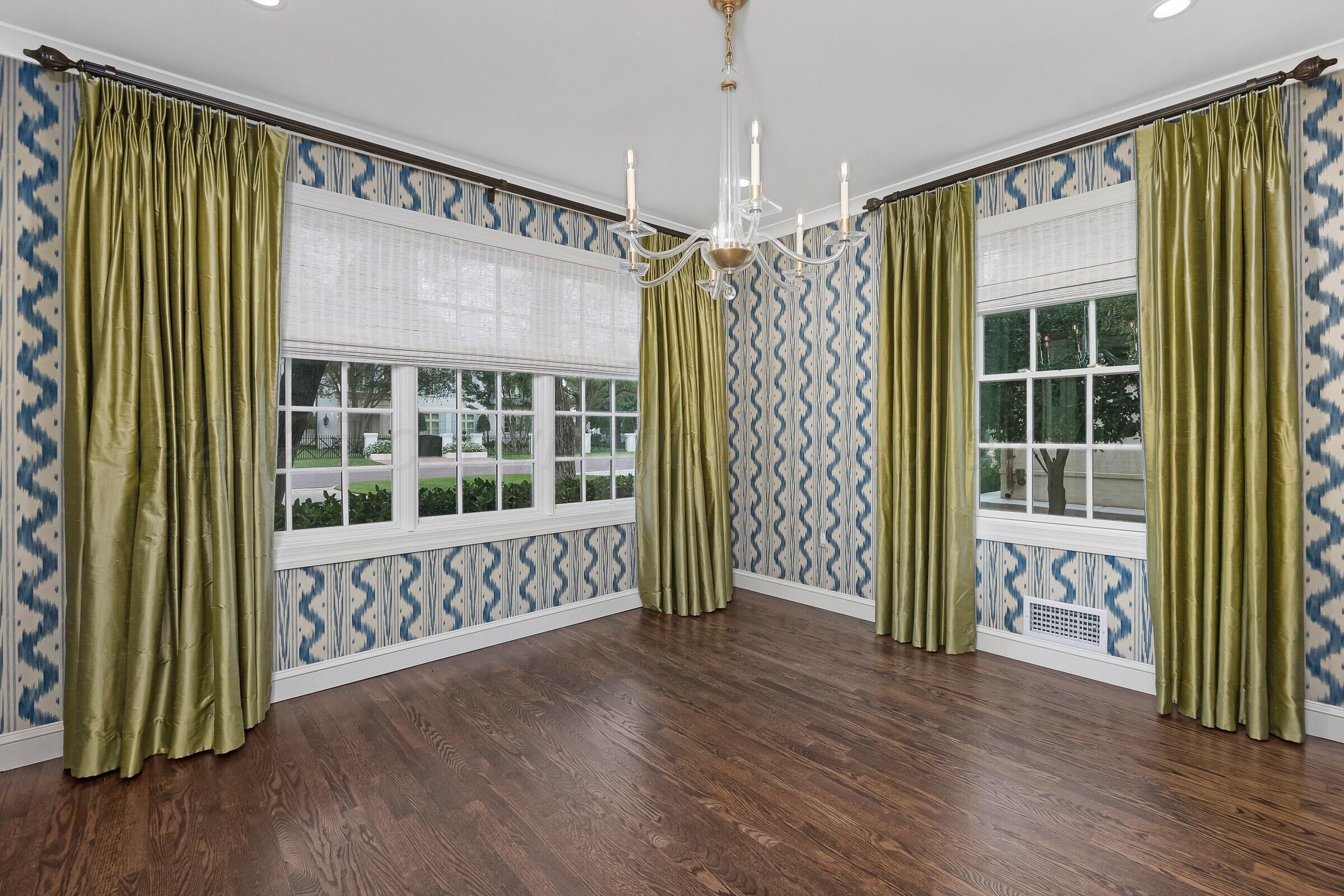 3003 South Hughes Street Amarillo, TX 79109 - Photo 9 of 76 a view of an entryway with wooden floor