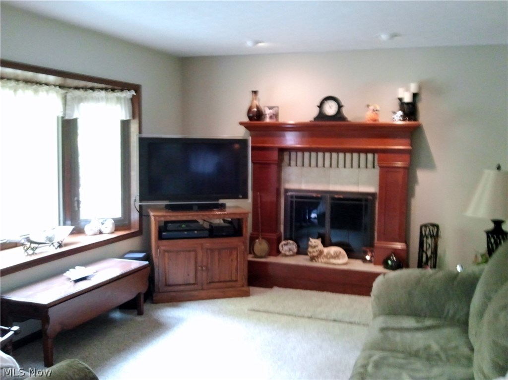 36725 Aurora Road Solon, OH 44139 - Photo 28 of 34 Family room with wood burning fireplace and cherry mantle.
