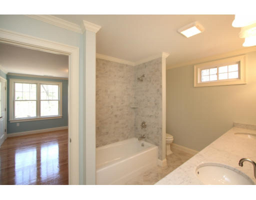 133 Shade Street Lexington, MA 02421 - Photo 12 of 21 a bathroom with a bathtub and a shower