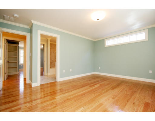 133 Shade Street Lexington, MA 02421 - Photo 14 of 21 a view of an empty room with wooden floor