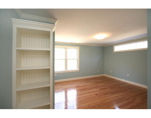 133 Shade Street Lexington, MA 02421 - Photo 15 of 21 a view of an empty room with a window