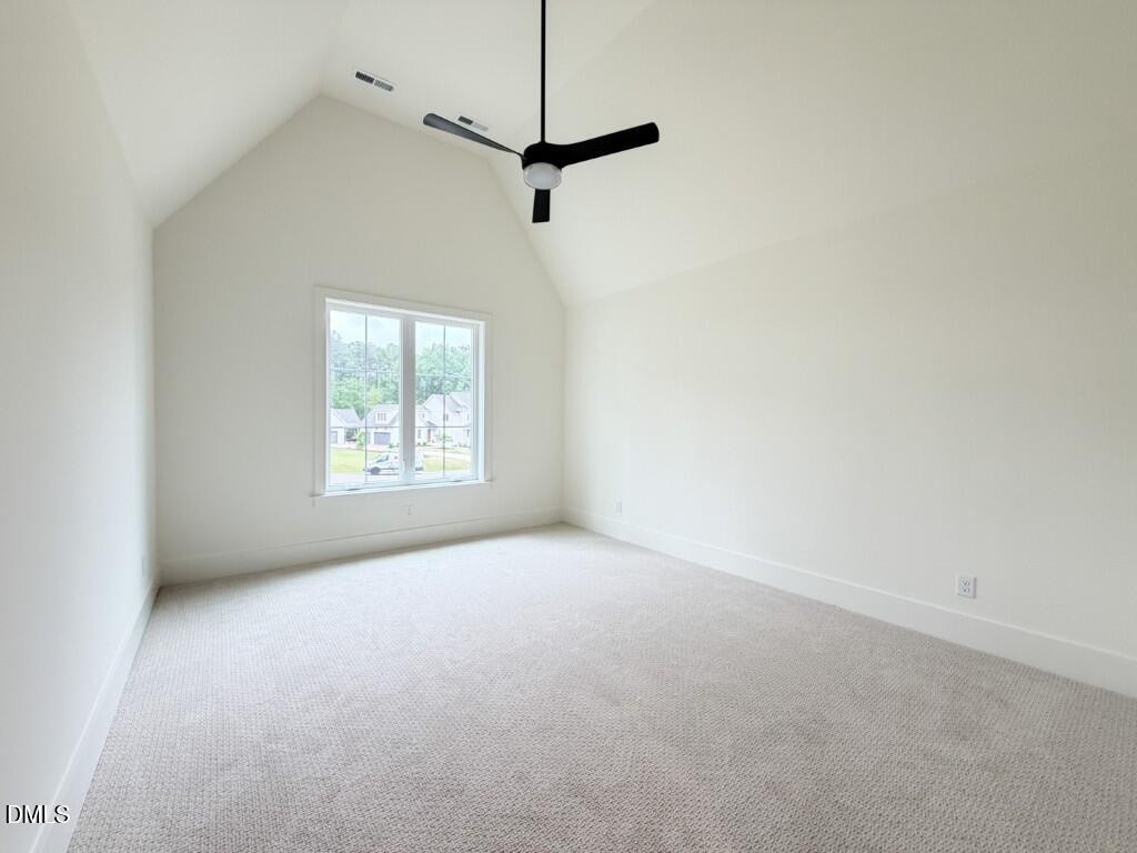 7441 Summer Tanager Trail Raleigh, NC 27614 - Photo 26 of 48 a view of a room with a window