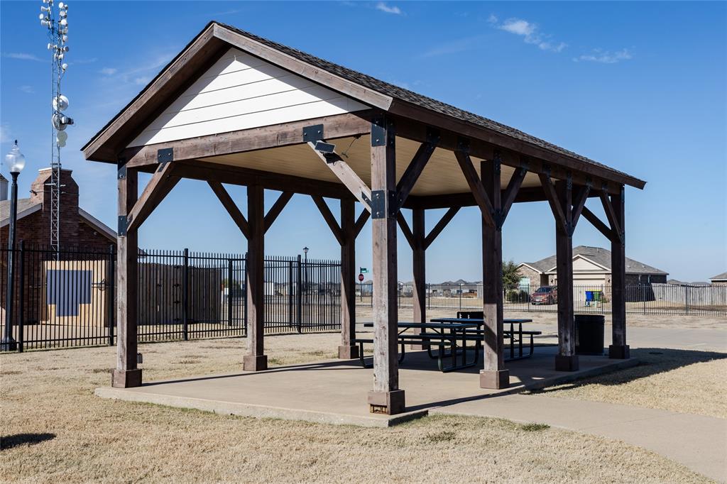 149 Independence Avenue Venus, TX 76084 - Photo 25 of 27 a view of porch with a flat screen tv