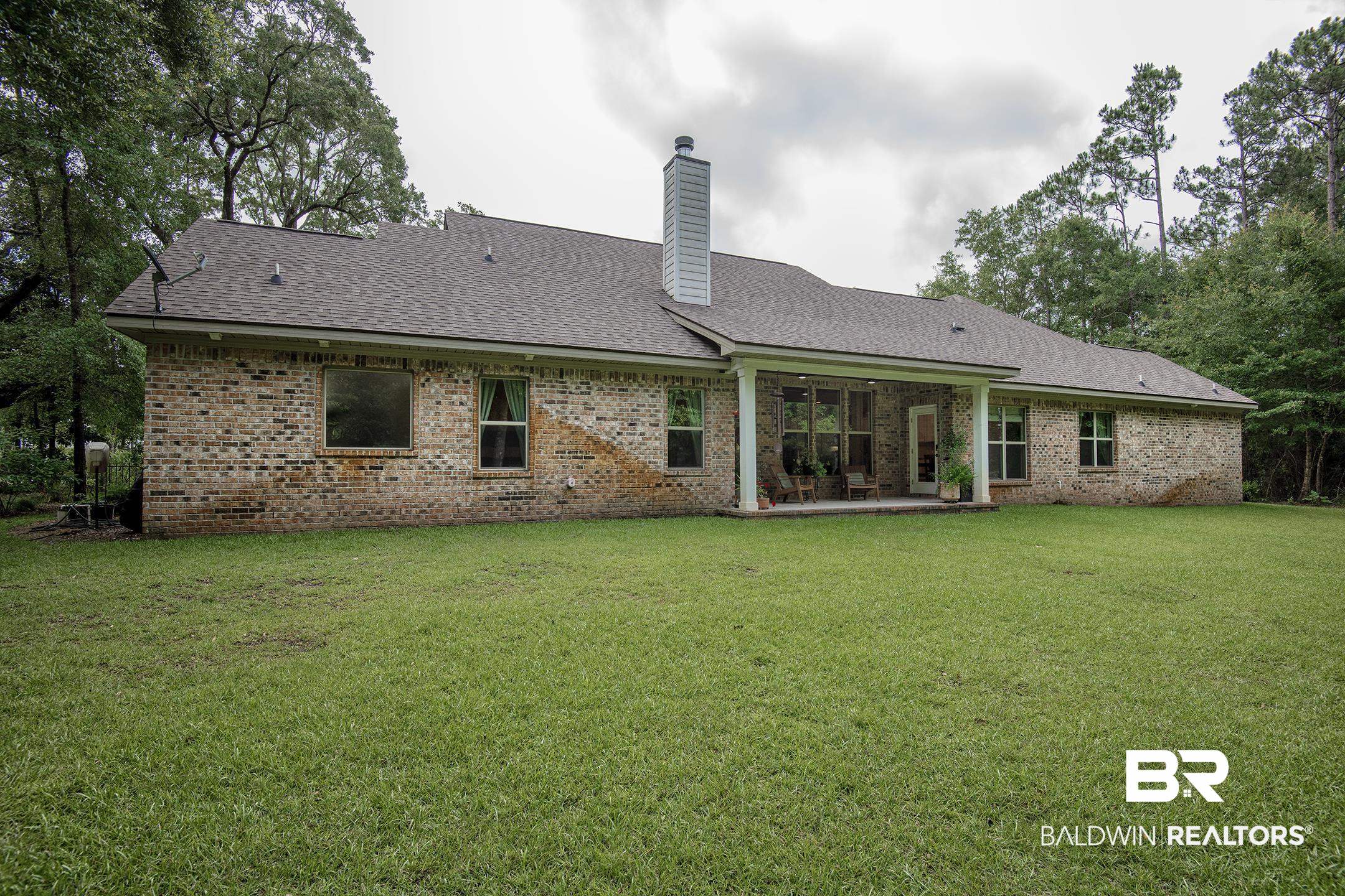 18754 Treasure Oaks Road Gulf Shores, AL 36542 - Photo 41 of 53 Back house