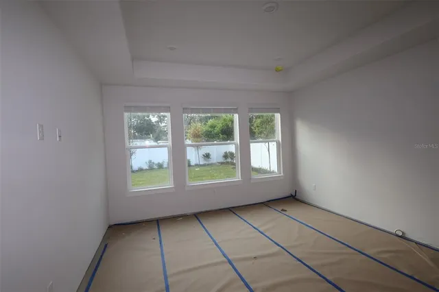 an empty room with windows