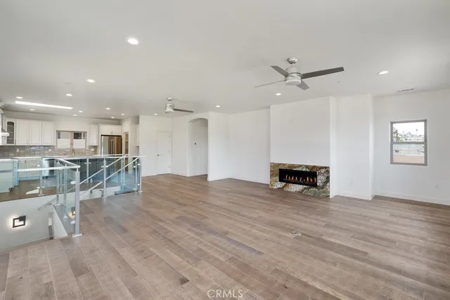 a kitchen with stainless steel appliances granite countertop a stove and a sink