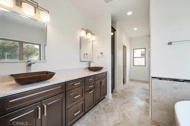 a view of an empty room with a fireplace and a yard