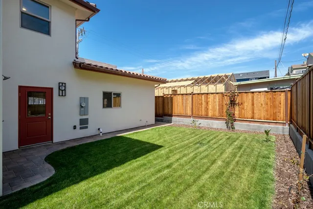 a very nice looking house with a large parking space