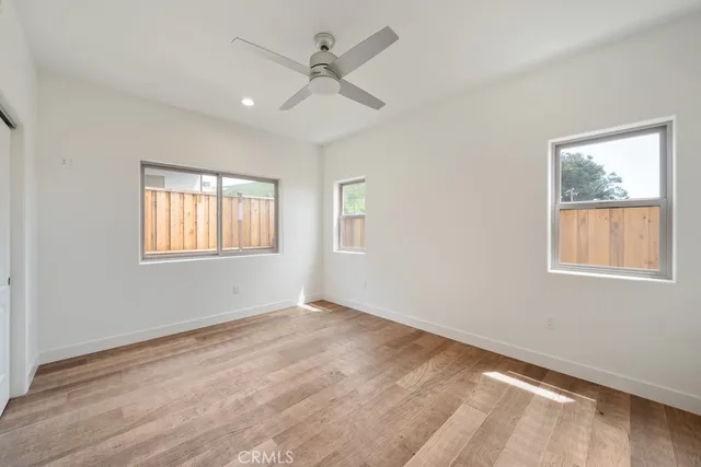 a front view of a house with yard and garage