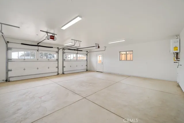 a view of a town with mountains in the background