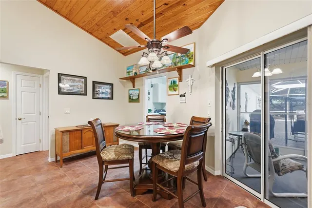 a kitchen with stainless steel appliances granite countertop a sink and a stove