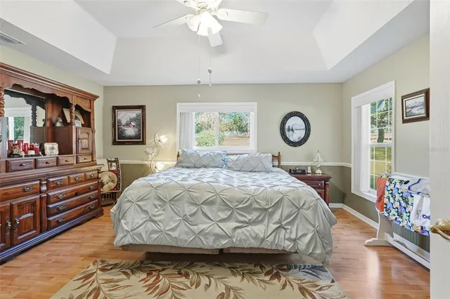 a bathroom with a granite countertop bathtub and a shower