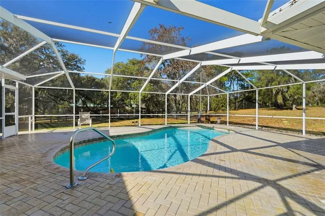 a house with trees in the background