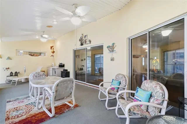 a view of a house with a snow in the yard