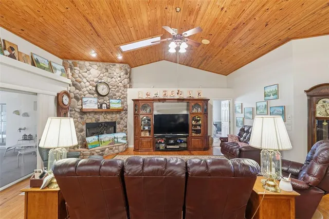 a kitchen with stainless steel appliances a refrigerator stove and microwave