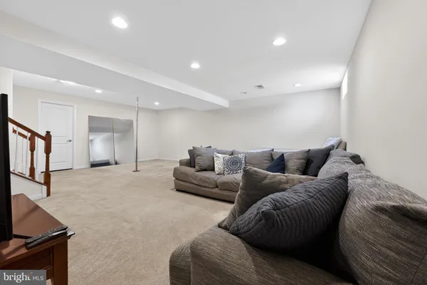 a living room with furniture and a couch