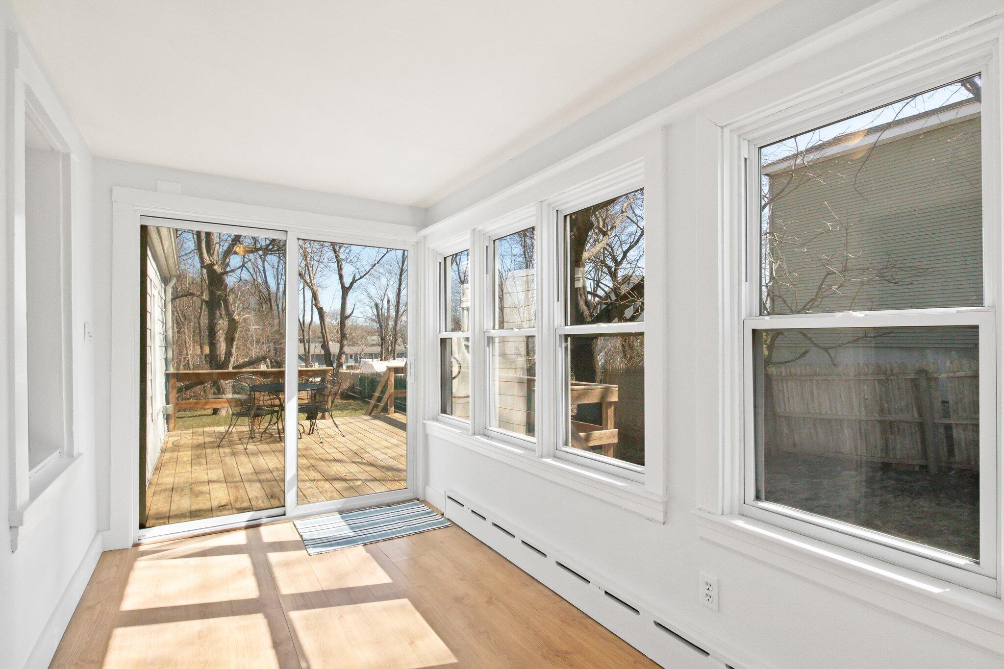 7 Spruce Street Fairhaven, MA 02719 - Photo 20 of 30 a view of an empty room with a window