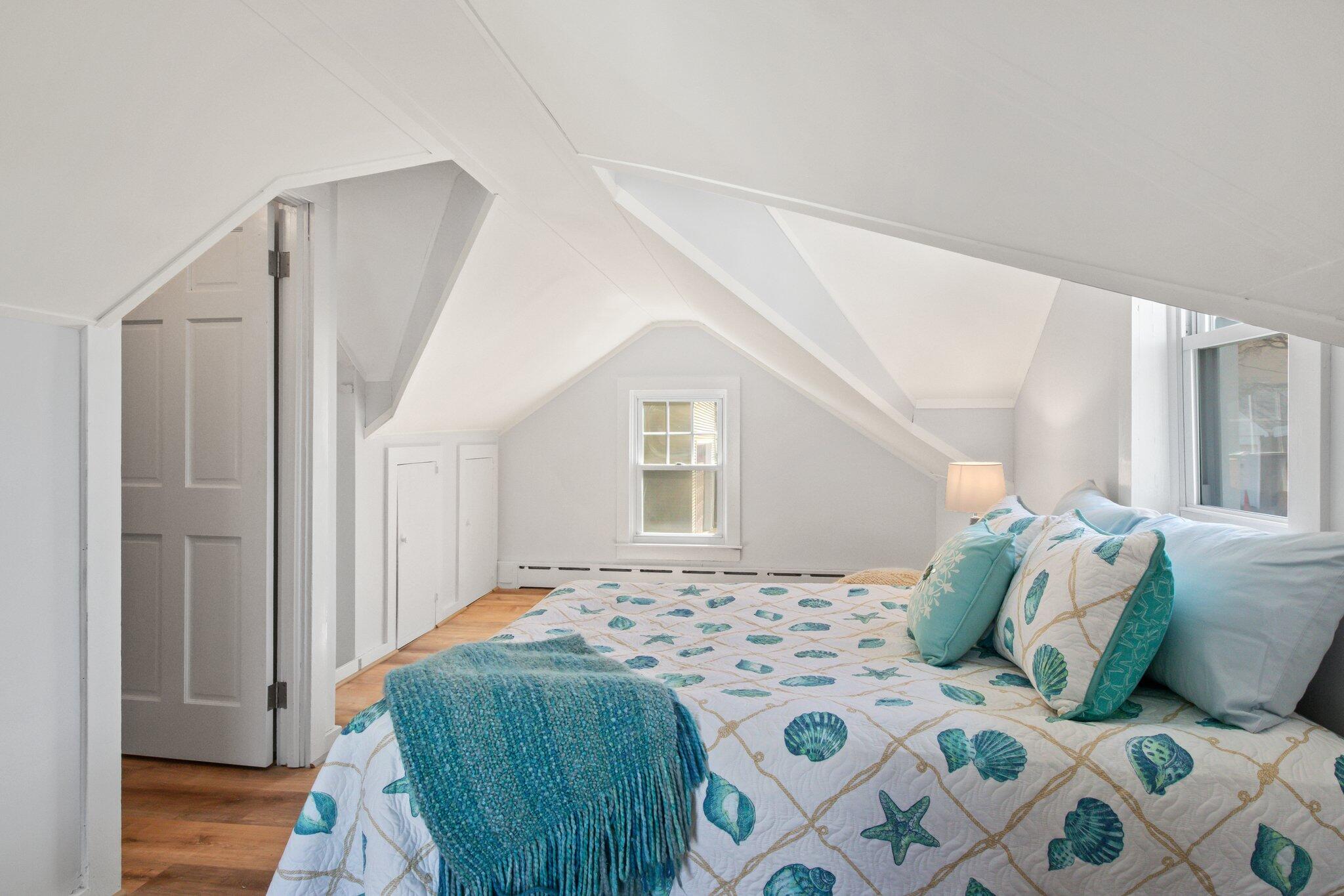 7 Spruce Street Fairhaven, MA 02719 - Photo 22 of 30 a bedroom with a large bed and a window