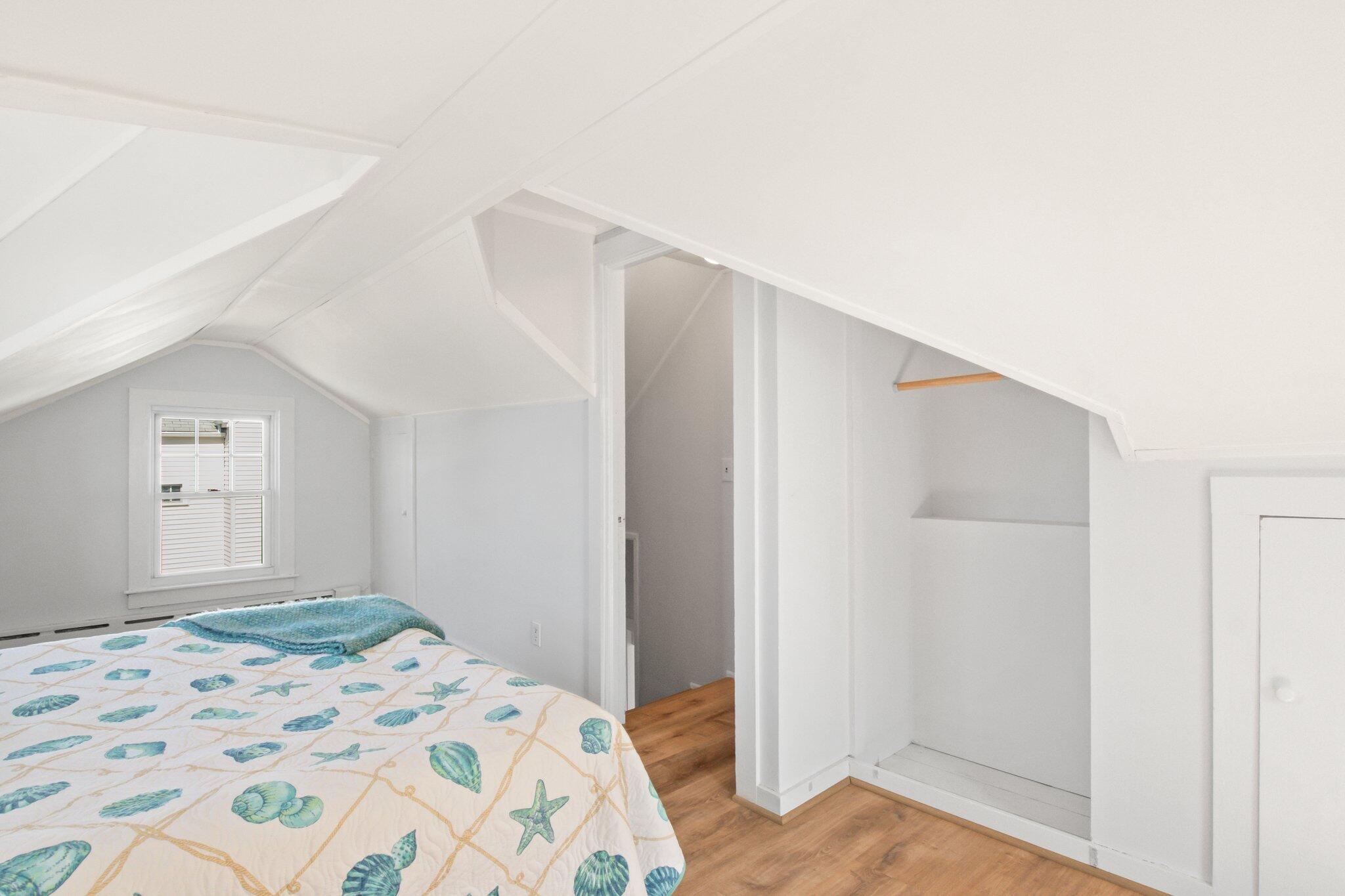 7 Spruce Street Fairhaven, MA 02719 - Photo 23 of 30 a bedroom with a bed and a cabinets