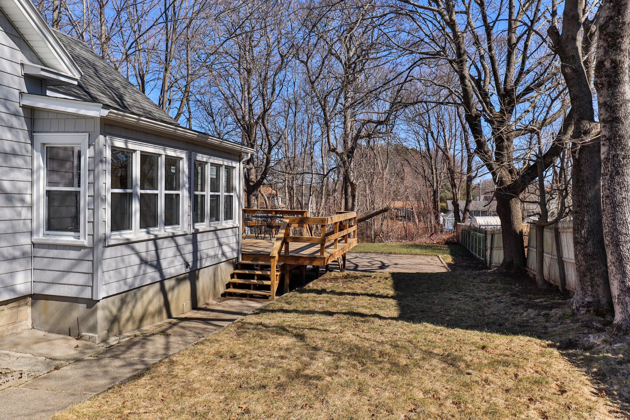 7 Spruce Street Fairhaven, MA 02719 - Photo 26 of 30 a view of wooden house with large trees