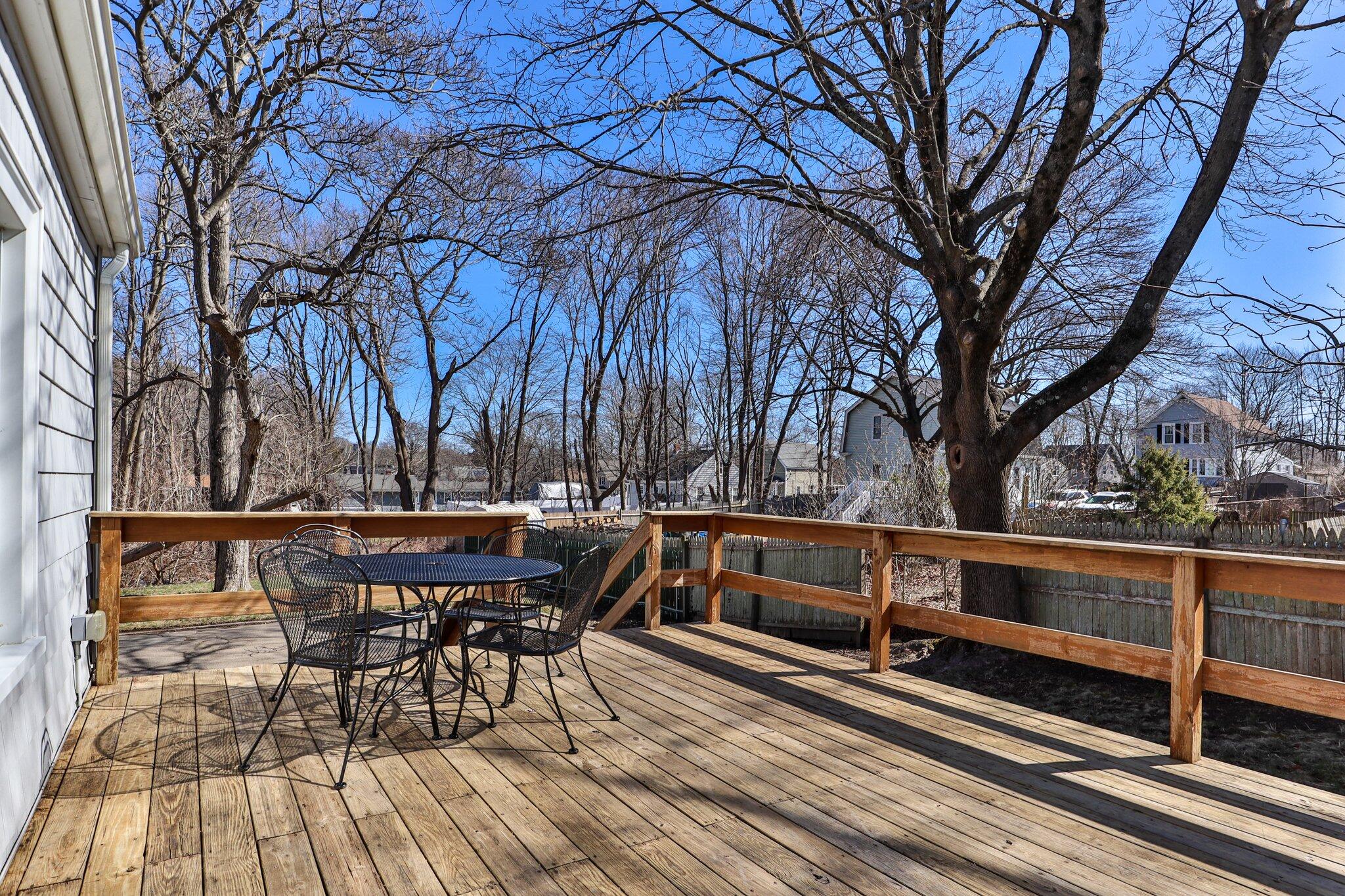 7 Spruce Street Fairhaven, MA 02719 - Photo 28 of 30 a view of backyard with seating space and trees