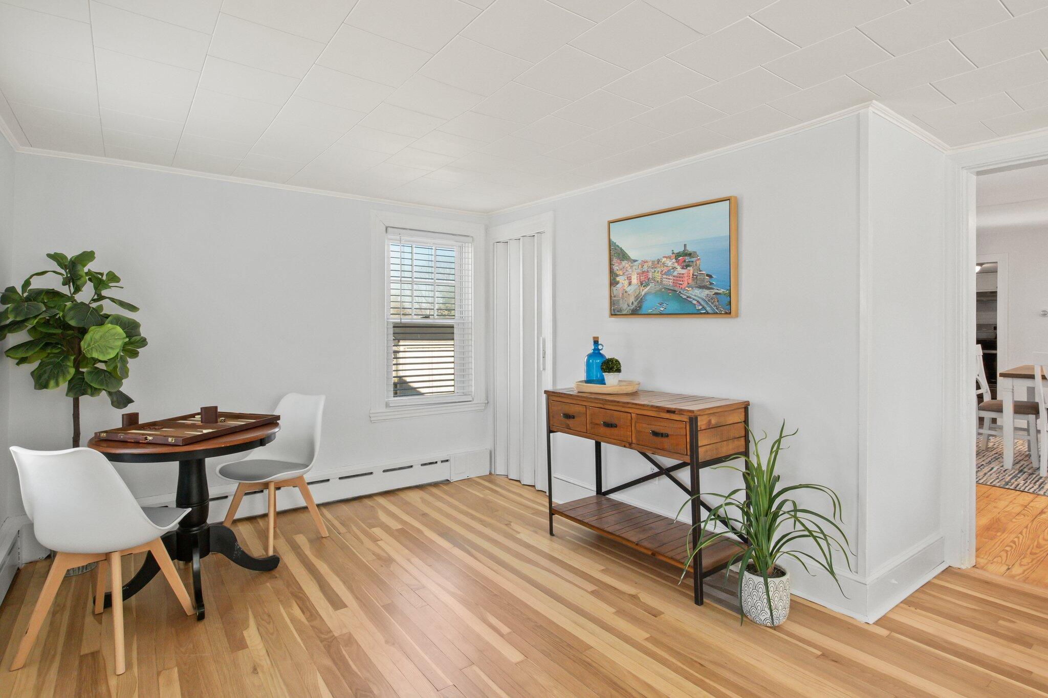 7 Spruce Street Fairhaven, MA 02719 - Photo 5 of 30 a bedroom with furniture and a potted plant