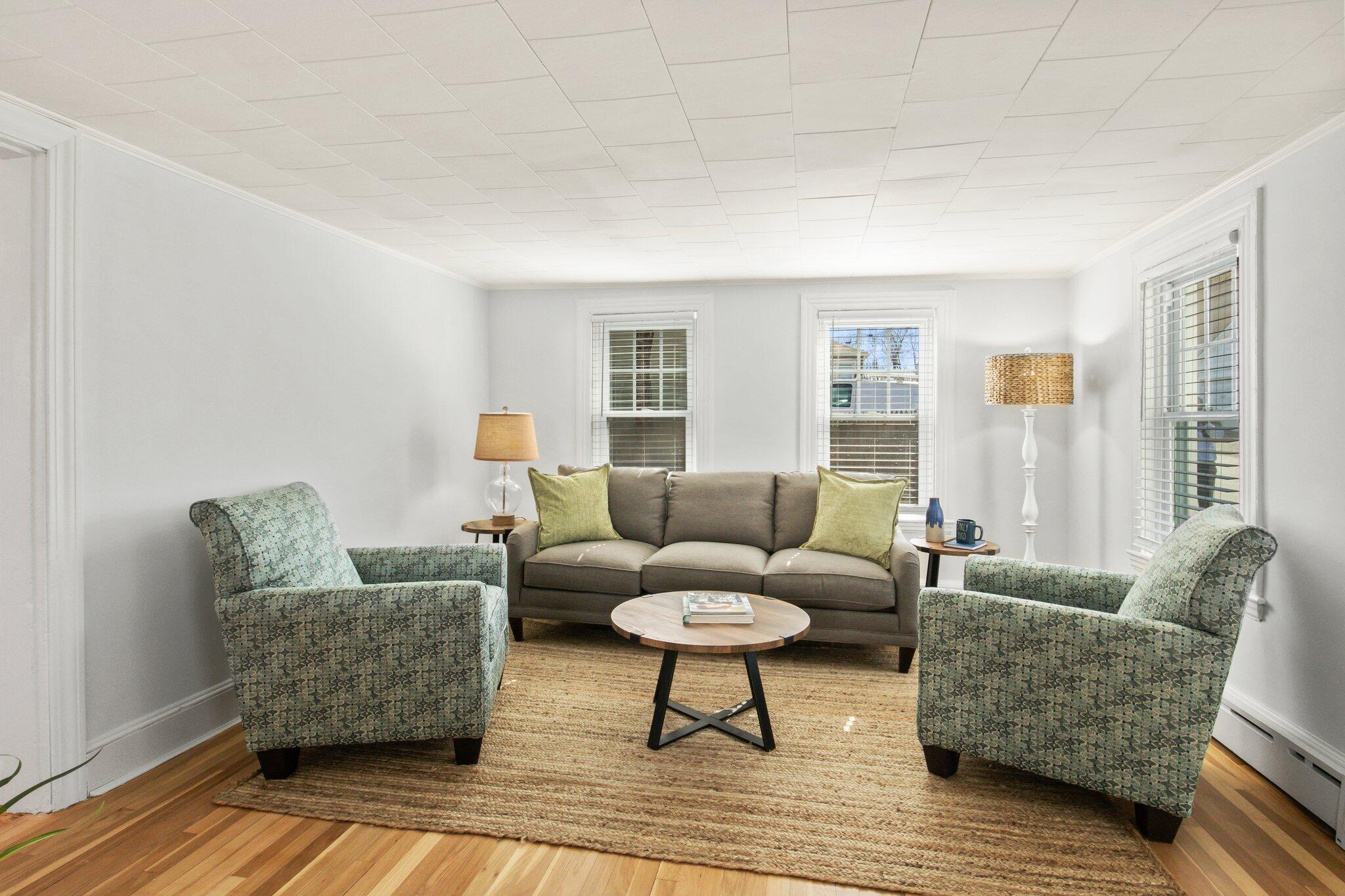 7 Spruce Street Fairhaven, MA 02719 - Photo 6 of 30 a living room with furniture and a couch