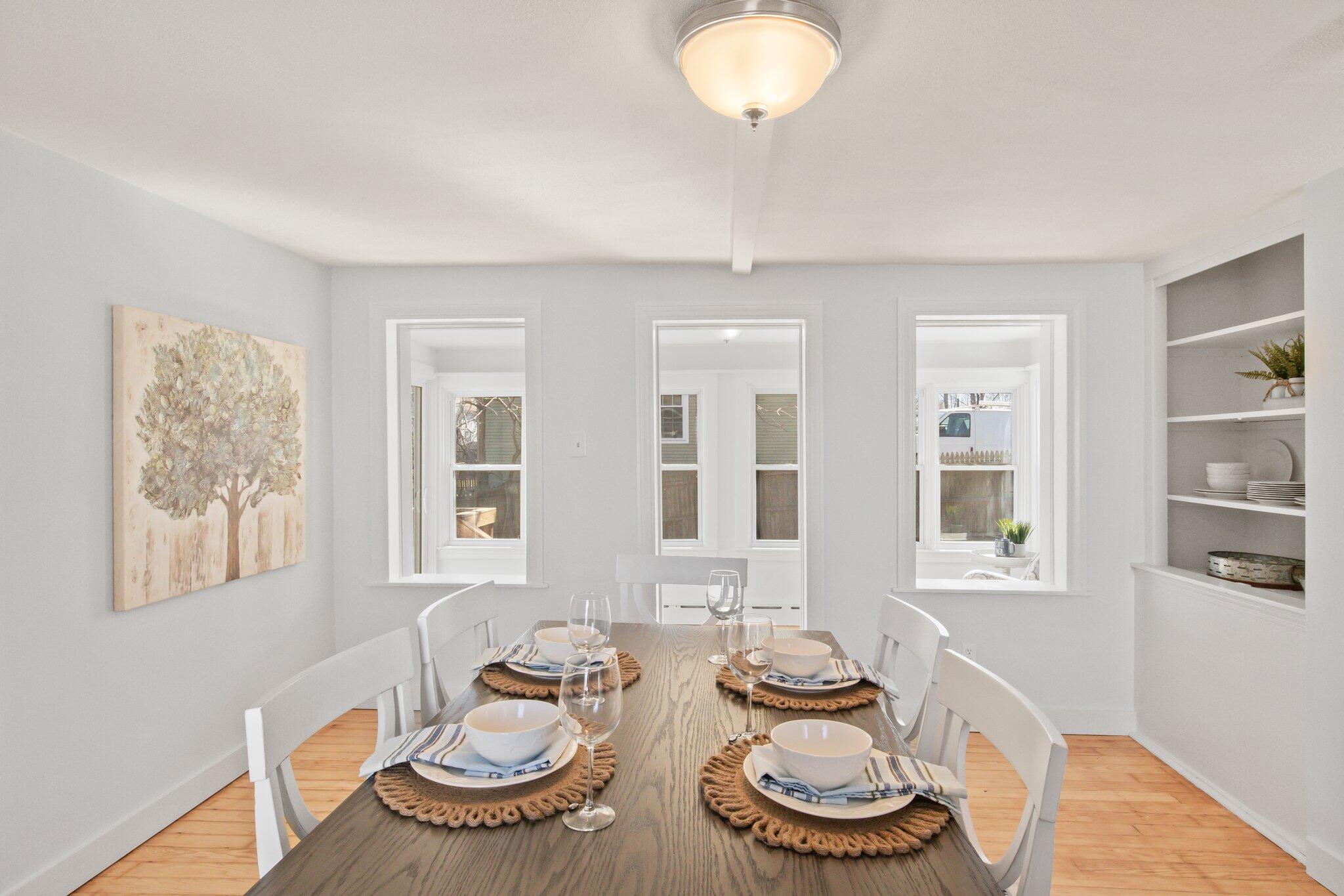 7 Spruce Street Fairhaven, MA 02719 - Photo 10 of 30 a table and chairs in a room