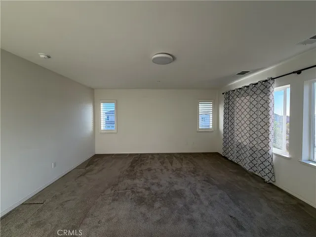 a bathroom with a shower and a toilet