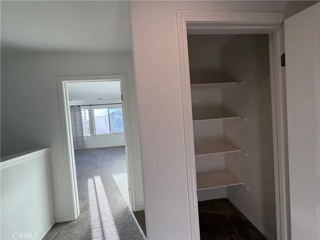 a bathroom with a sink double vanity and a mirror
