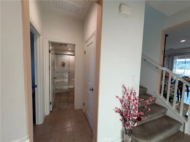 a view of livingroom with furniture flat screen tv and a window