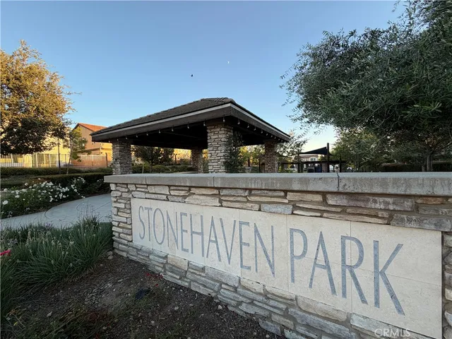 a view of swimming pool with seating area