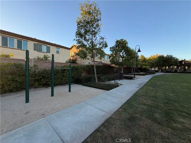 a view of a back yard with a chair