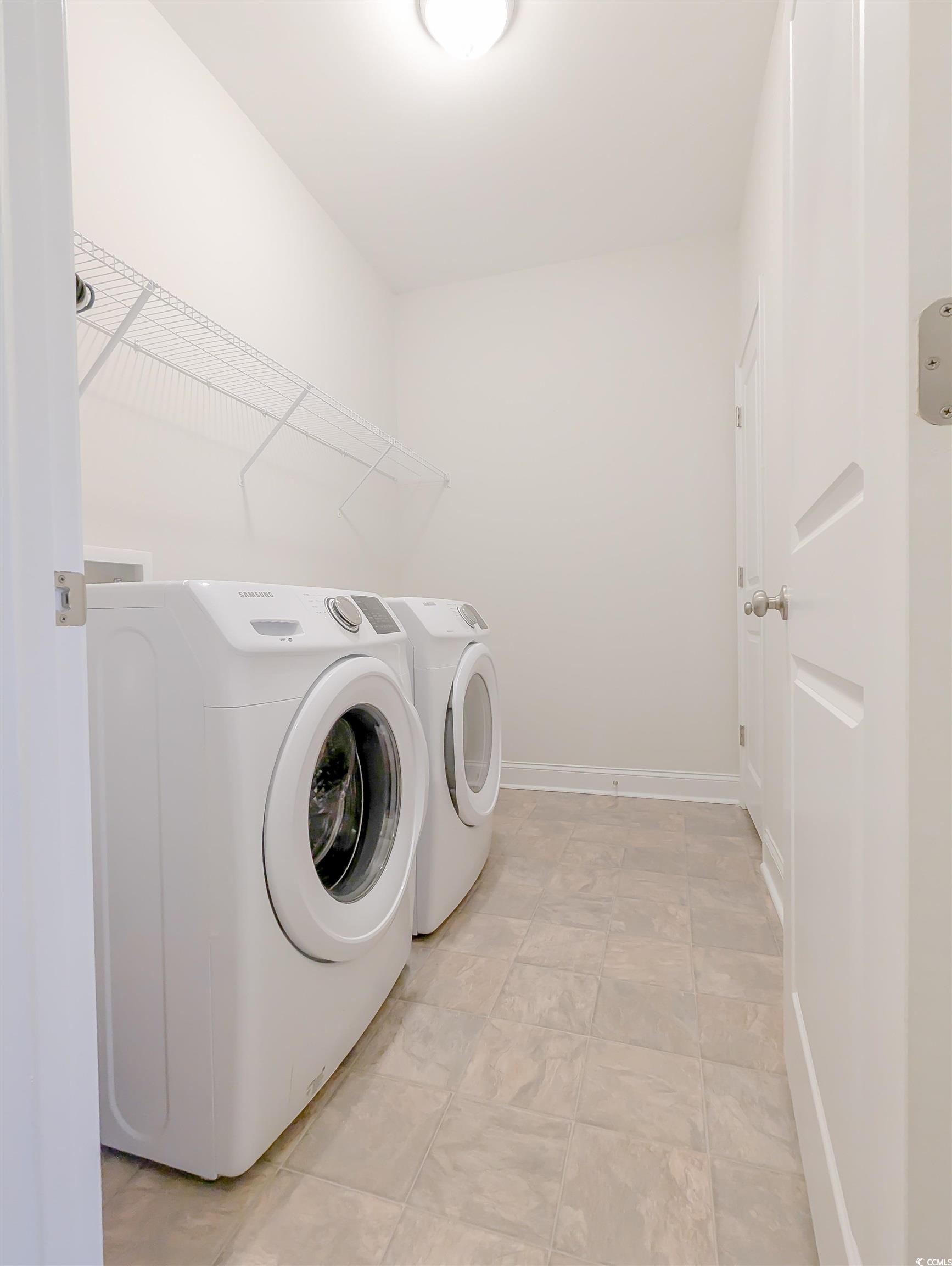 2052 Silver Island Way Murrells Inlet, SC 29576 - Photo 13 of 24 Laundry room featuring independent washer and dryer and baseboards