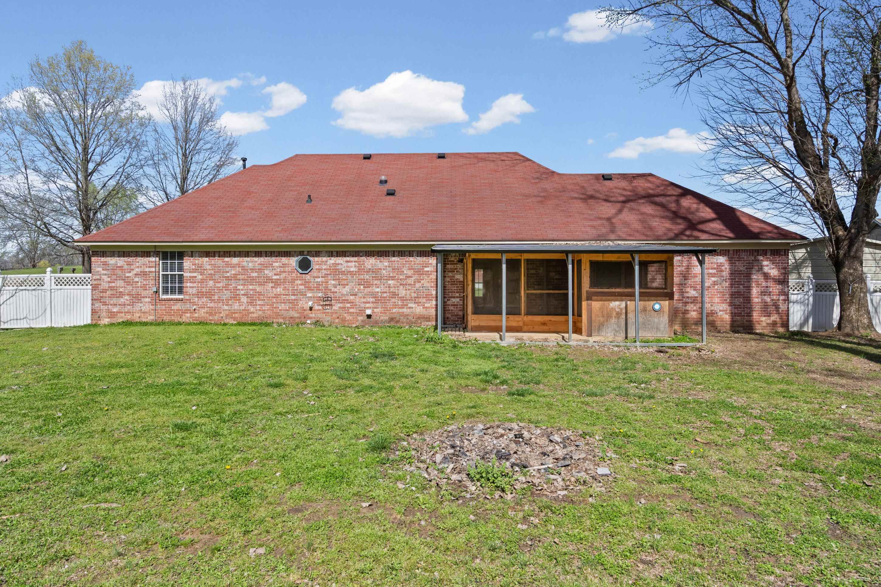 511 Rae Drive Munford, TN 38058 - Photo 19 of 30 a front view of a house with garden