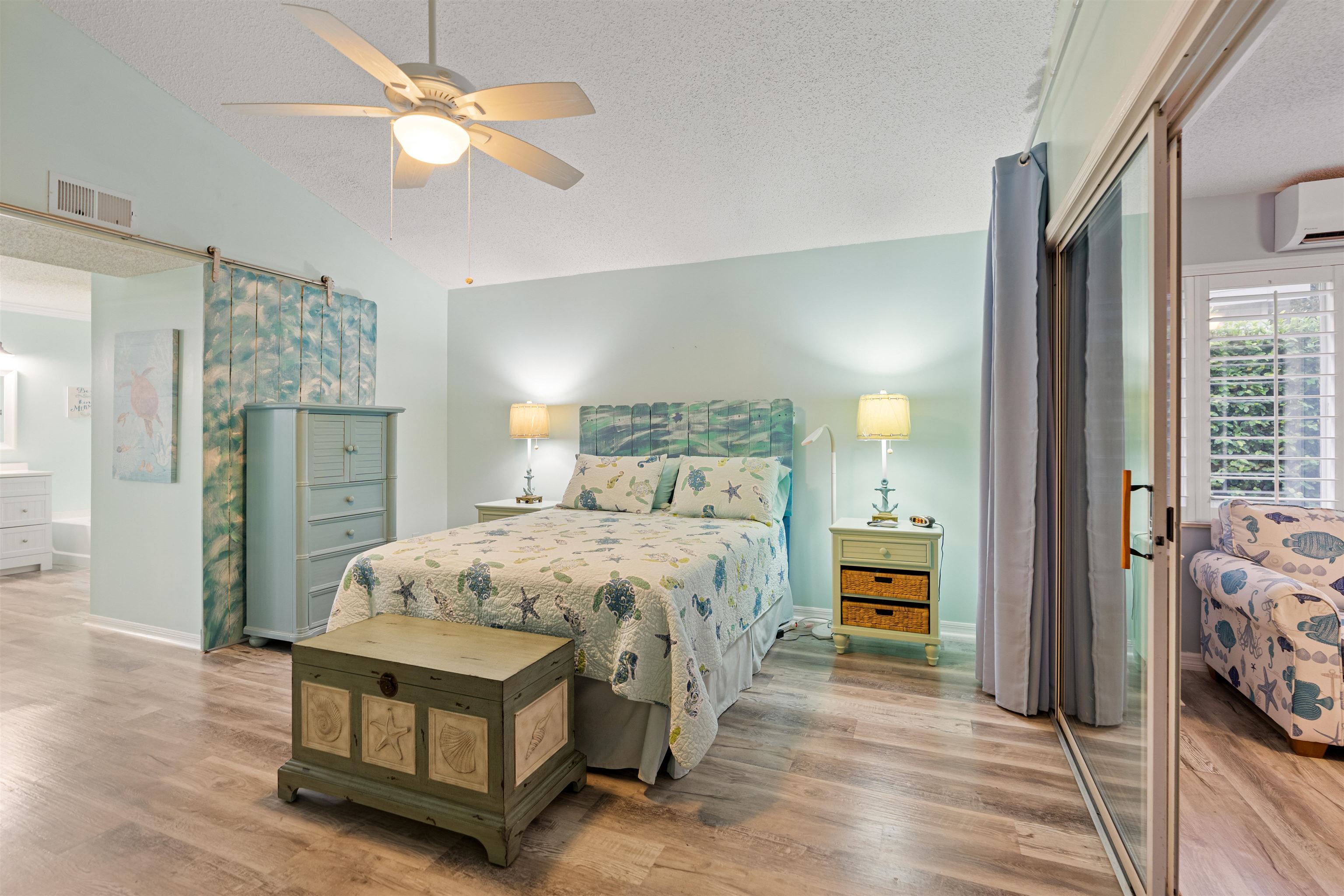362 Monika Place St. Augustine, FL 32080 - Photo 12 of 42 a bedroom with a bed and a chandelier