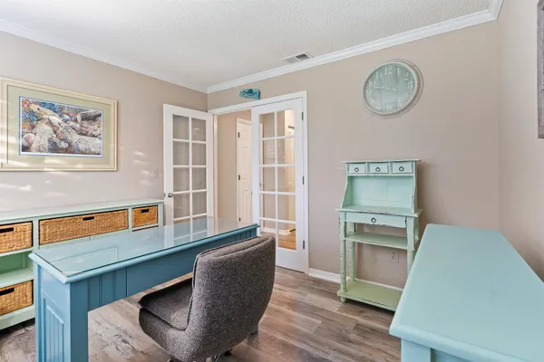 a room with furniture and a window