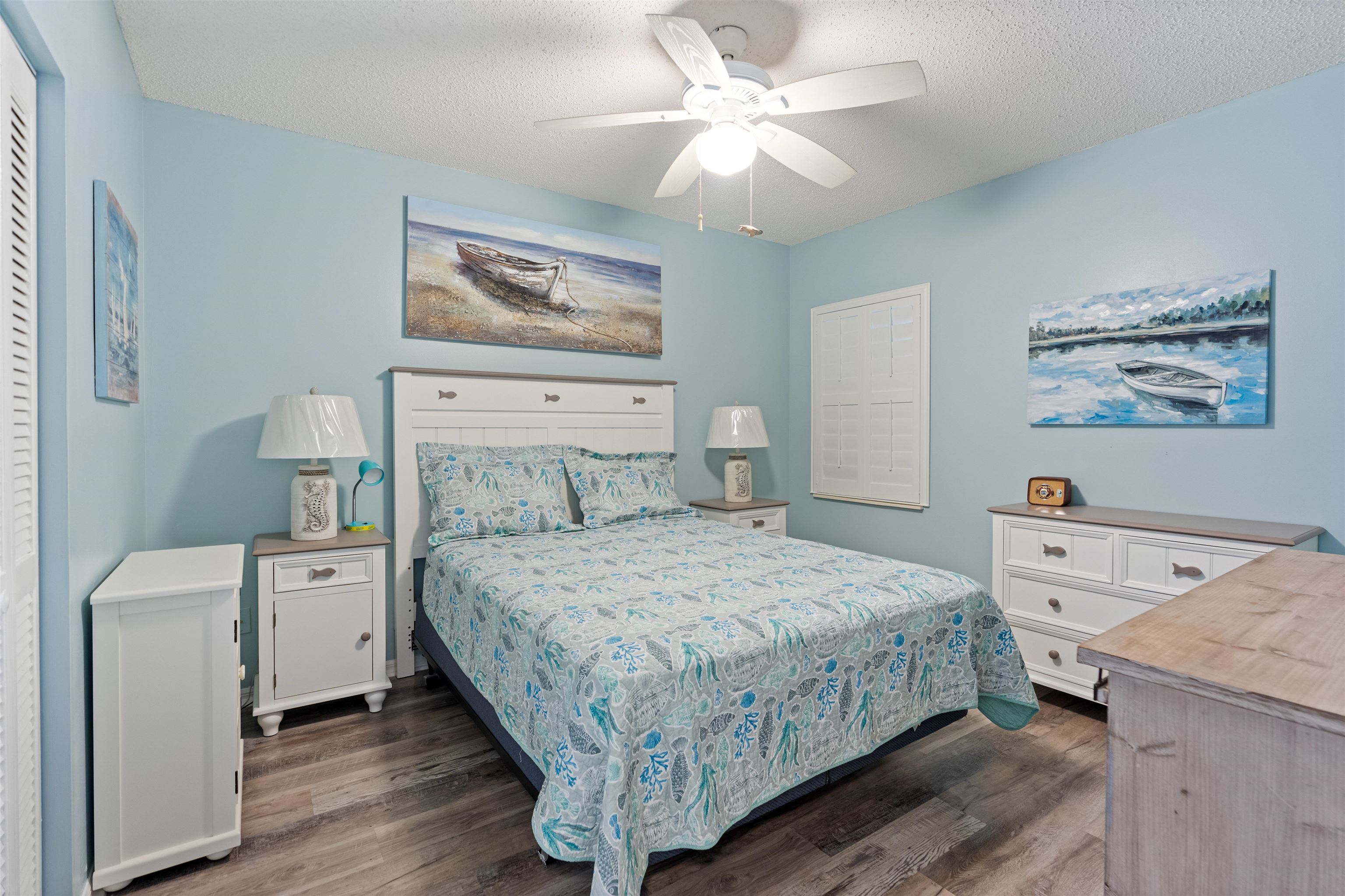 362 Monika Place St. Augustine, FL 32080 - Photo 24 of 42 a bedroom with a bed and a chandelier
