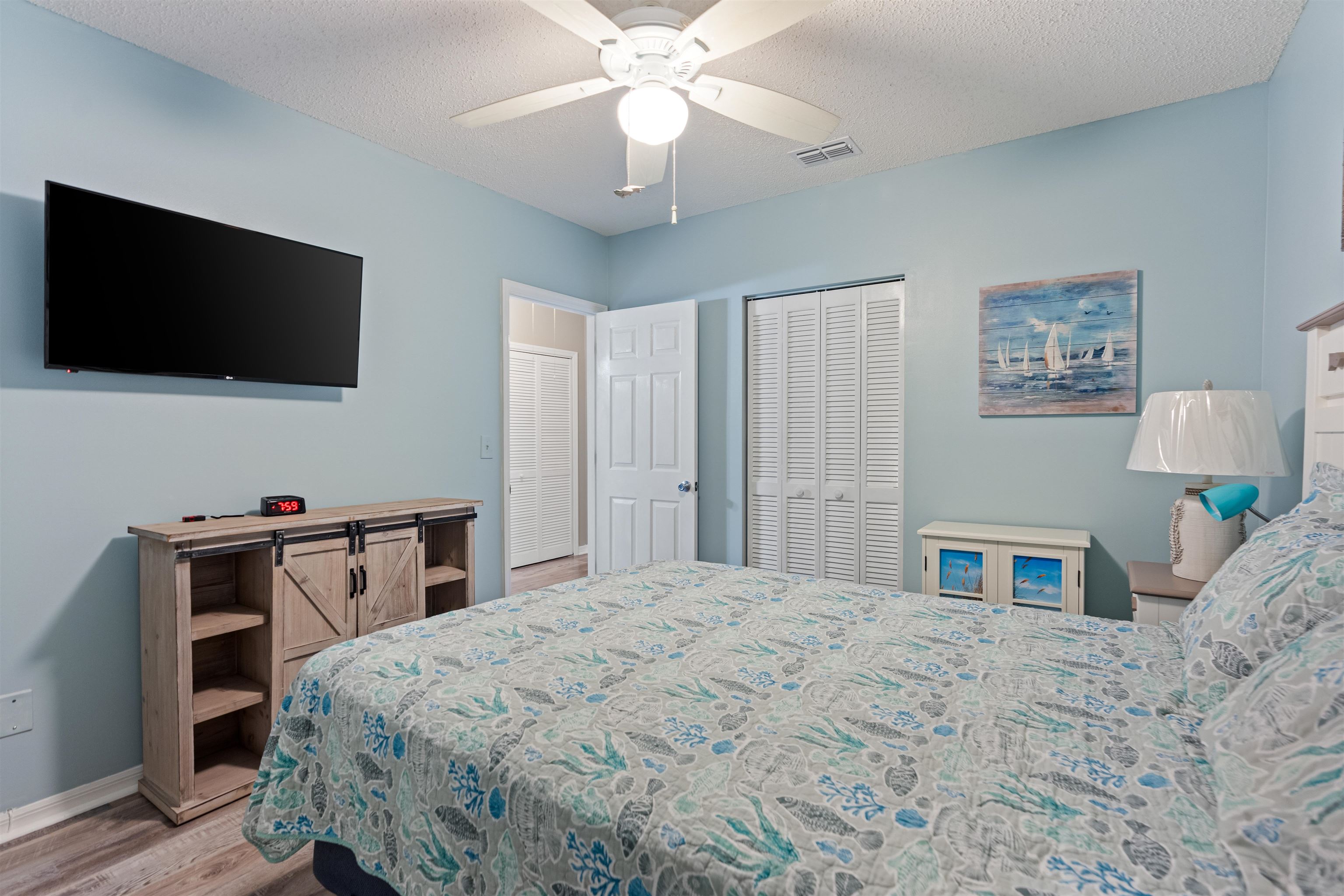 362 Monika Place St. Augustine, FL 32080 - Photo 25 of 42 a bedroom with a bed and a flat screen tv