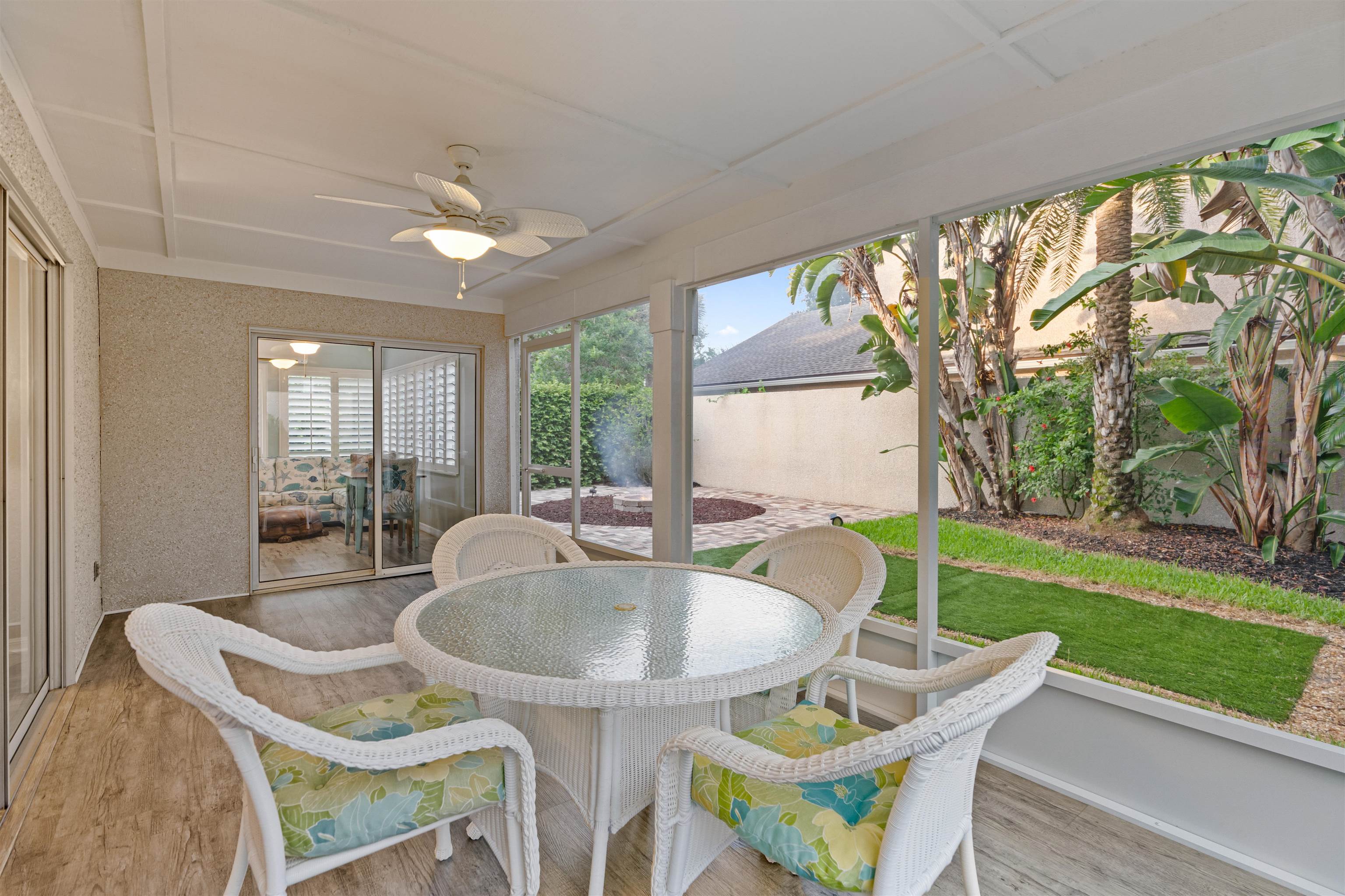 362 Monika Place St. Augustine, FL 32080 - Photo 26 of 42 a dining room with furniture and a floor to ceiling window