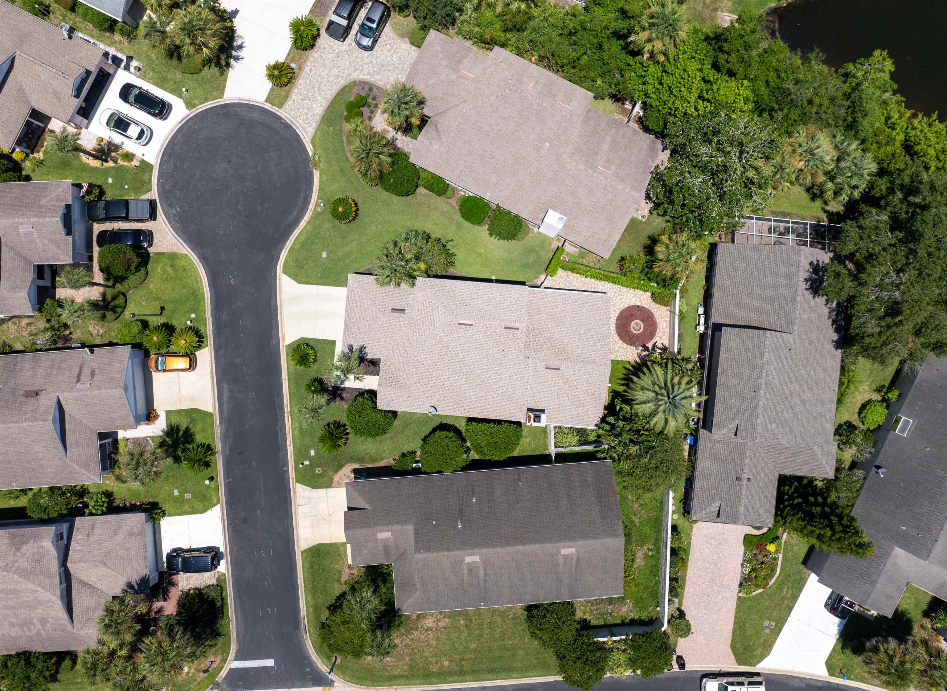 362 Monika Place St. Augustine, FL 32080 - Photo 33 of 42 an aerial view of a house with a yard and large trees