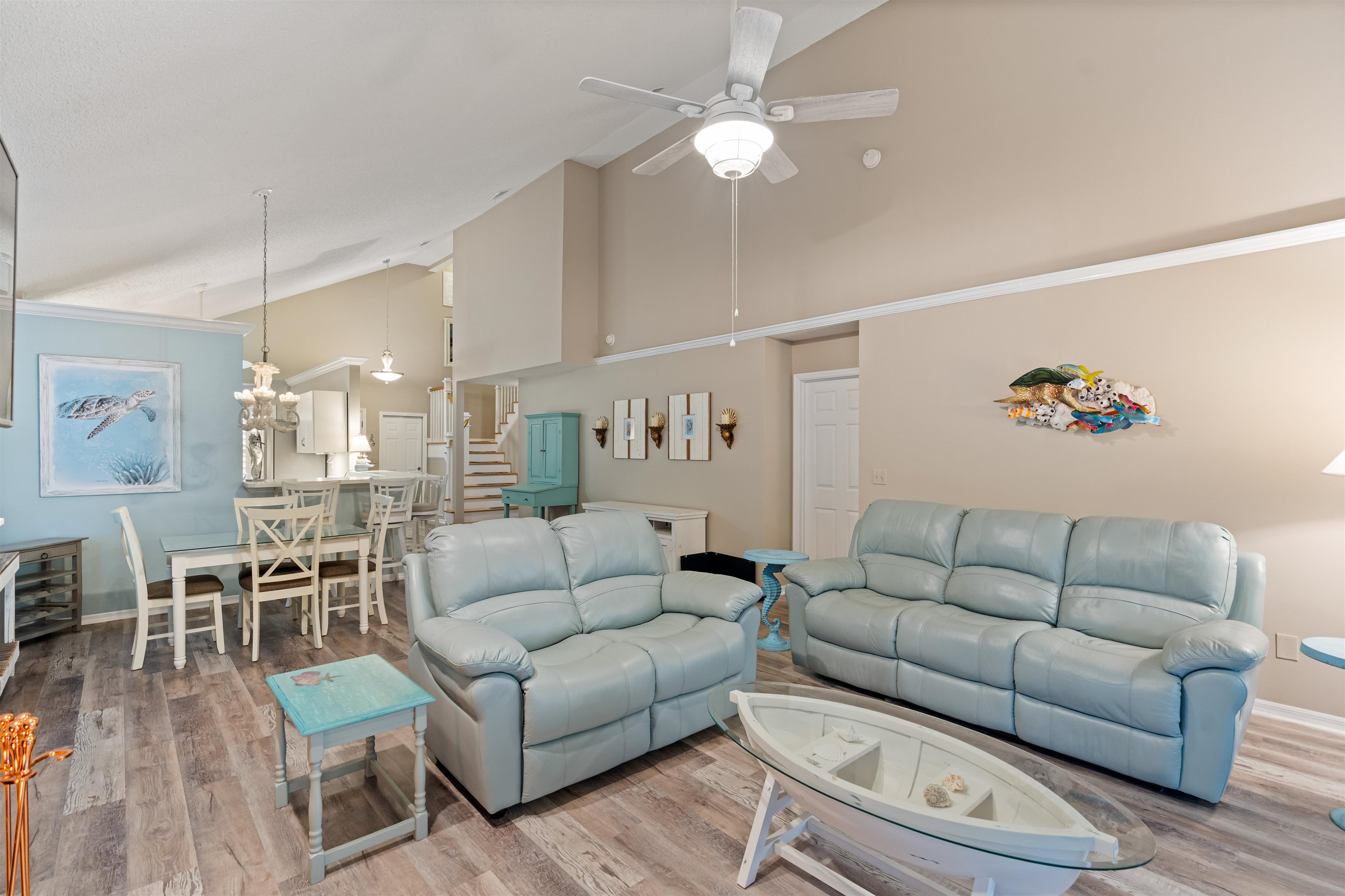 362 Monika Place St. Augustine, FL 32080 - Photo 8 of 42 a living room with furniture kitchen view and a chandelier